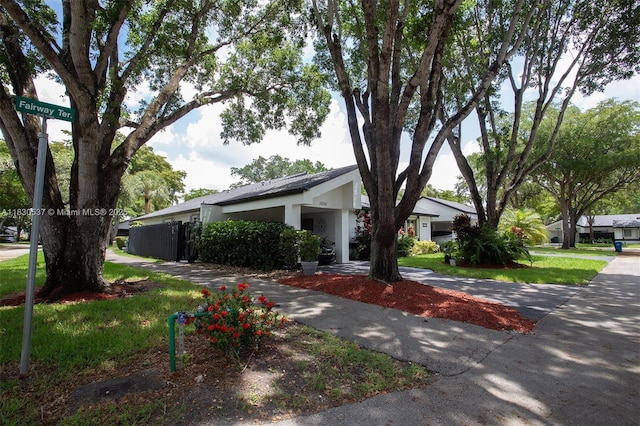 16041 Fairway Ter Unit 121, Weston, FL 33326 - view of front facade featuring stucco siding and driveway