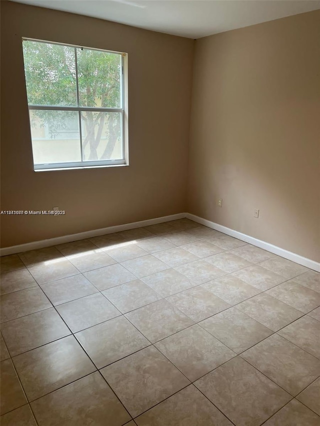 1666 SE 27th Ct Unit 208, Homestead, FL 33035 - tiled spare room with plenty of natural light
