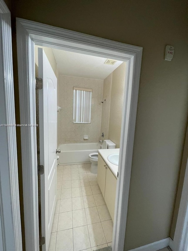 1666 SE 27th Ct Unit 208, Homestead, FL 33035 - full bathroom featuring vanity, tile patterned floors, and washtub / shower combination
