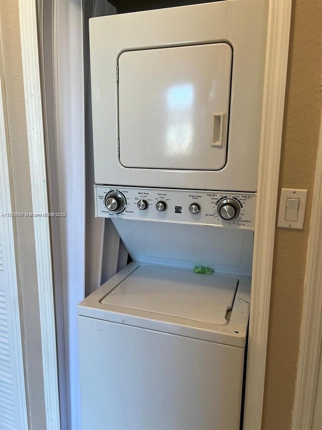 1666 SE 27th Ct Unit 208, Homestead, FL 33035 - washroom with stacked washing machine and dryer