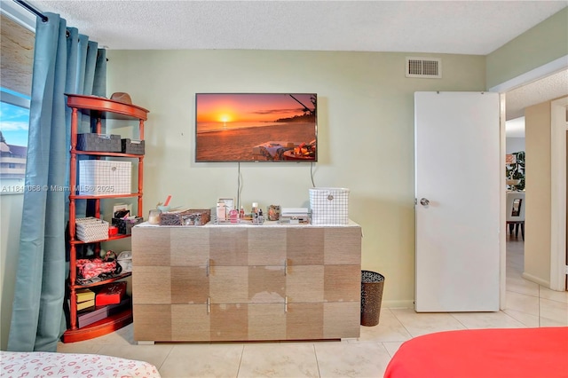 3651 Environ Blvd Unit 461, Lauderhill, FL 33319 - bedroom featuring tile patterned floors and a textured ceiling