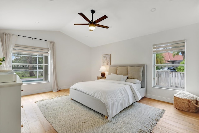 1503 NW 178th Ln, Pembroke Pines, FL 33029 - bedroom featuring multiple windows, light wood-style flooring, vaulted ceiling, and ceiling fan