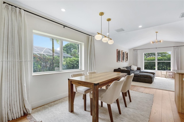 1503 NW 178th Ln, Pembroke Pines, FL 33029 - dining area with lofted ceiling, light wood-style floors, a chandelier, and recessed lighting