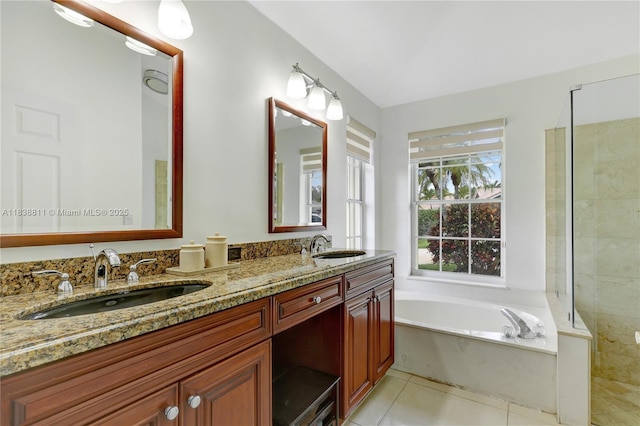 1503 NW 178th Ln, Pembroke Pines, FL 33029 - full bath featuring a garden tub, double vanity, tile patterned floors, and a tile shower