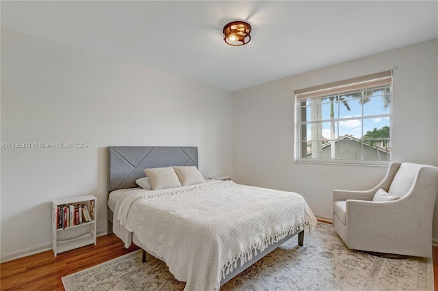 1503 NW 178th Ln, Pembroke Pines, FL 33029 - bedroom featuring wood finished floors and baseboards