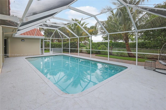 1503 NW 178th Ln, Pembroke Pines, FL 33029 - view of swimming pool with a patio area and glass enclosure