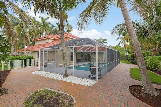 1503 NW 178th Ln, Pembroke Pines, FL 33029 - view of swimming pool with a patio and glass enclosure