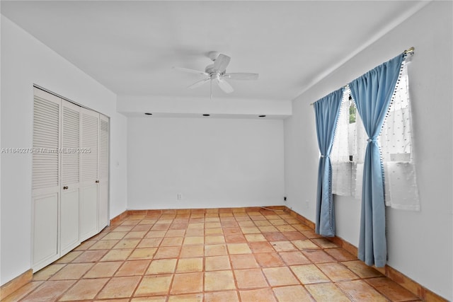 2924 Day Ave Unit N211, Miami, FL 33133 - unfurnished bedroom featuring ceiling fan and a closet
