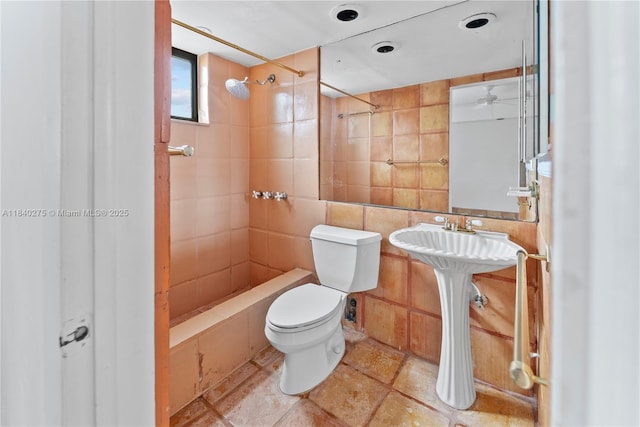 2924 Day Ave Unit N211, Miami, FL 33133 - full bathroom featuring a tile shower, tile walls, and a ceiling fan