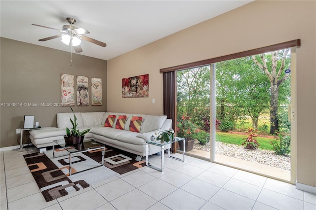 14053 SW 49th St Unit 7, Miramar, FL 33027 - living area featuring healthy amount of natural light, light tile patterned floors, and a ceiling fan