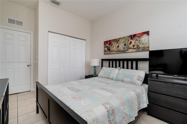14053 SW 49th St Unit 7, Miramar, FL 33027 - bedroom with light tile patterned flooring and a closet