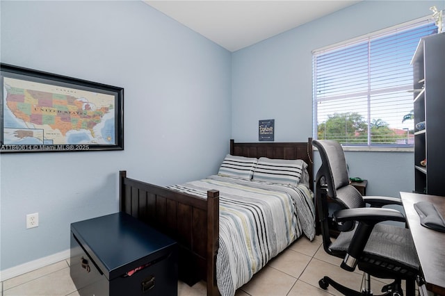 14053 SW 49th St Unit 7, Miramar, FL 33027 - bedroom with light tile patterned flooring and a desk