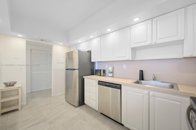19370 Collins Ave Unit 1425, Sunny Isles Beach, FL 33160 - kitchen featuring recessed lighting, appliances with stainless steel finishes, light countertops, and white cabinets