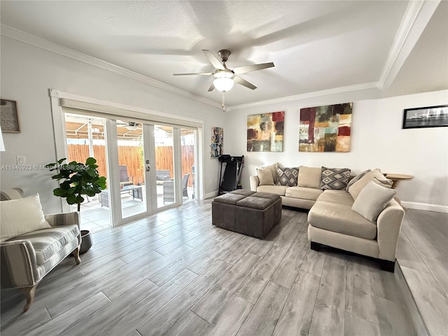 11 Olive Dr Unit E, Hialeah, FL 33010 - living room with a ceiling fan, french doors, light wood finished floors, and ornamental molding