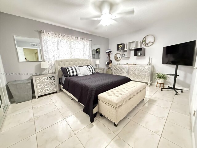 11 Olive Dr Unit E, Hialeah, FL 33010 - bedroom with tile patterned flooring and a ceiling fan