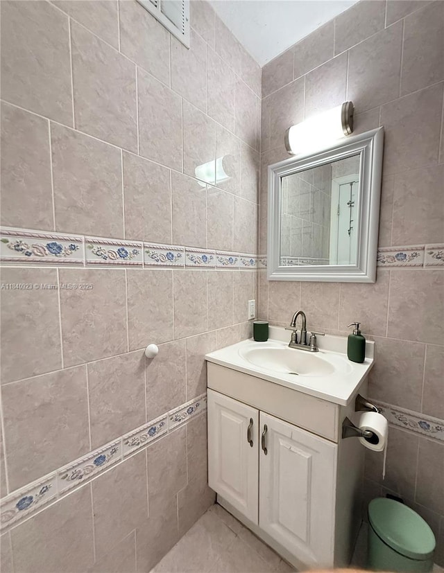 11 Olive Dr Unit E, Hialeah, FL 33010 - half bath with tile walls and vanity