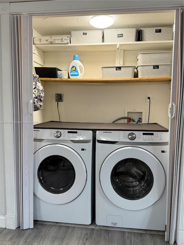 11 Olive Dr Unit E, Hialeah, FL 33010 - laundry area with washer and dryer and wood finished floors