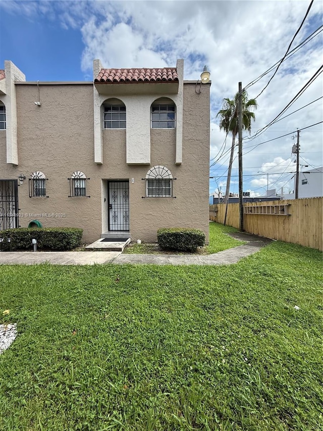 11 Olive Dr Unit E, Hialeah, FL 33010 - mediterranean / spanish house featuring stucco siding and a tile roof