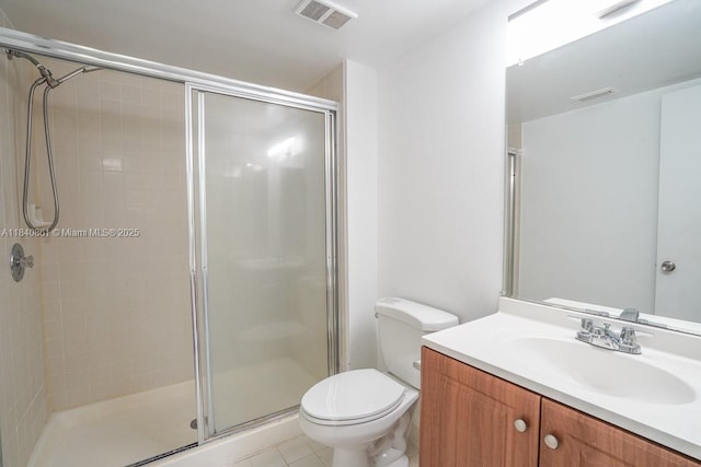 9033 Wiles Rd Unit 304, Coral Springs, FL 33067 - bathroom with a shower stall, vanity, and tile patterned flooring