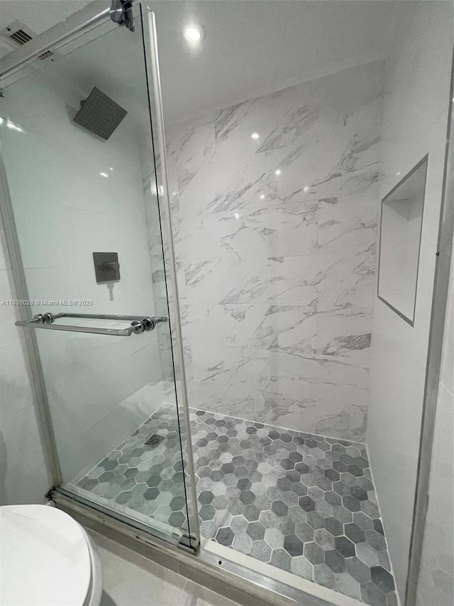 9143 SW 77th Ave Unit B105, Miami, FL 33156 - bathroom featuring a shower stall and toilet
