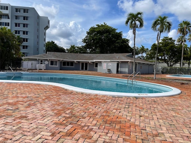 9143 SW 77th Ave Unit B105, Miami, FL 33156 - community pool with a patio