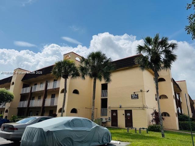 2711 N Pine Island Rd Unit 211, Sunrise, FL 33322 - photo 2
