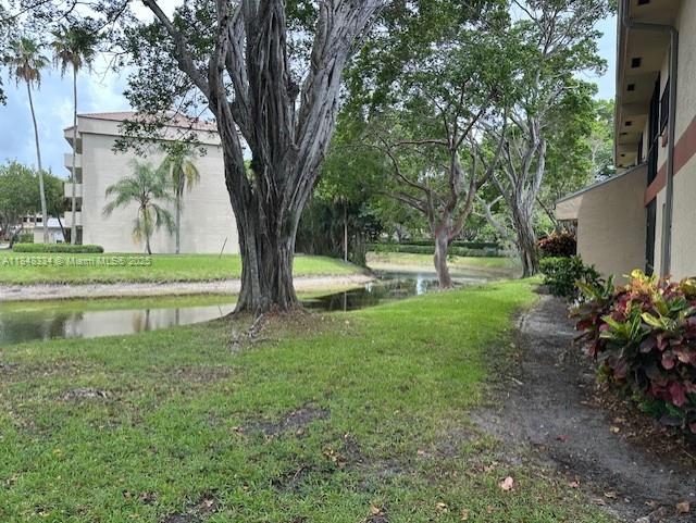 4110 S Carambola Cir S Unit 2111, Coconut Creek, FL 33066 - photo 24
