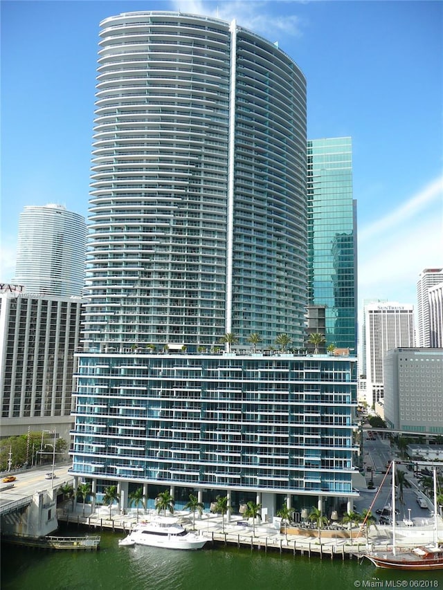 view of building exterior with a water view