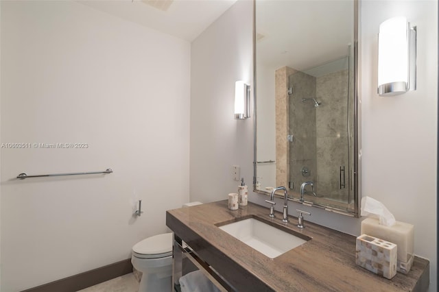 bathroom featuring walk in shower, toilet, and vanity