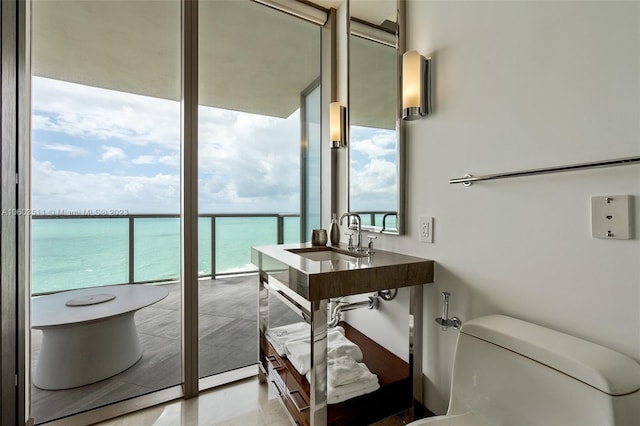 interior space featuring sink and a water view