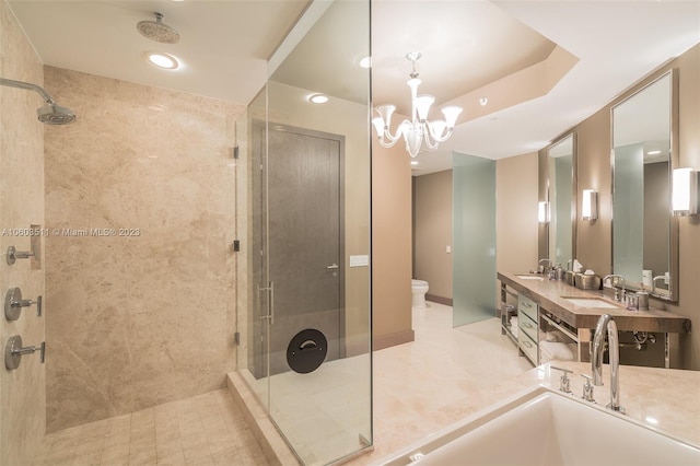 bathroom featuring dual vanity, walk in shower, tile patterned flooring, and toilet