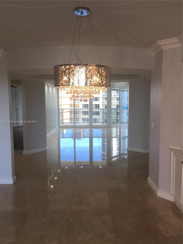 interior space with tile patterned floors and a chandelier