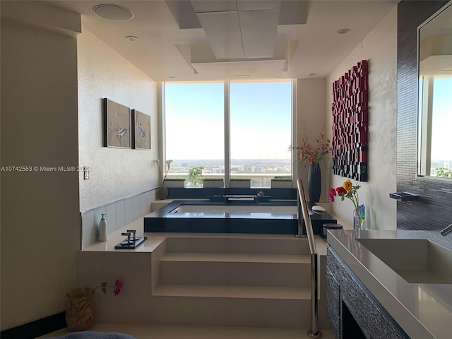 kitchen featuring backsplash and a wealth of natural light