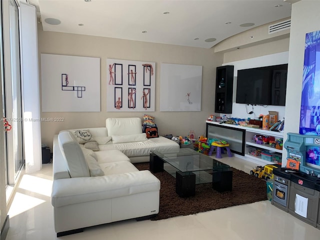 living room with light tile floors