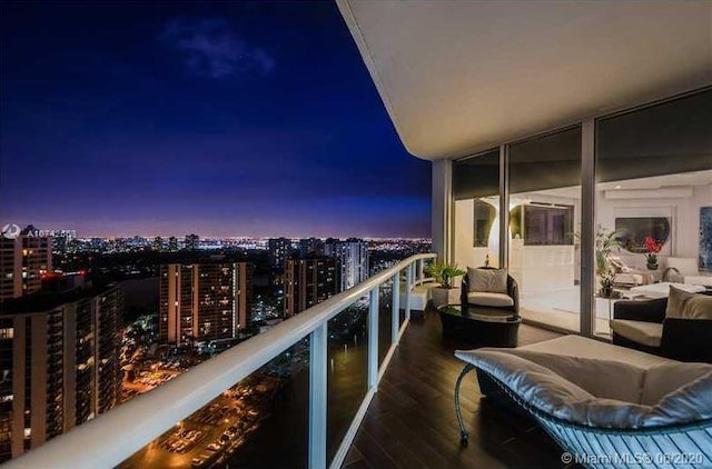 view of balcony at dusk