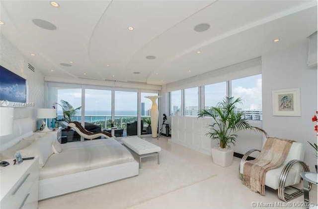 living room featuring a water view