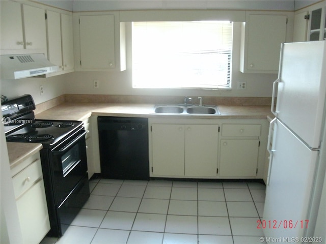 kitchen featuring light tile patterned flooring, exhaust hood, sink, and black appliances