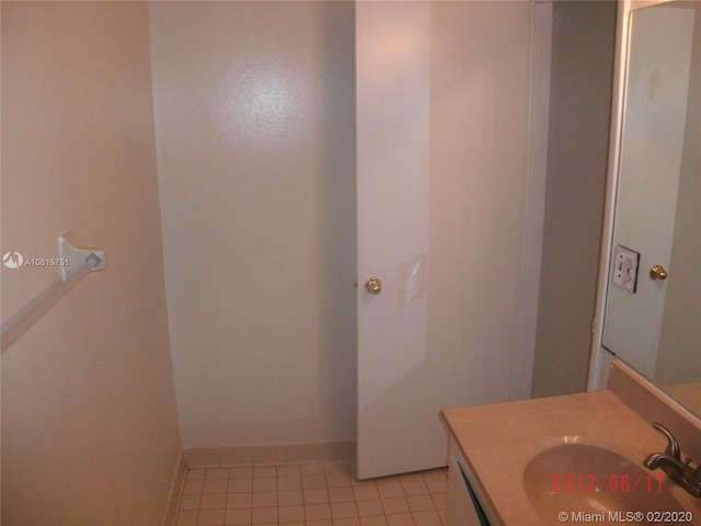 bathroom featuring tile patterned floors and vanity