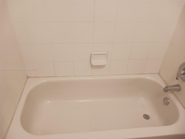 bathroom featuring a tub