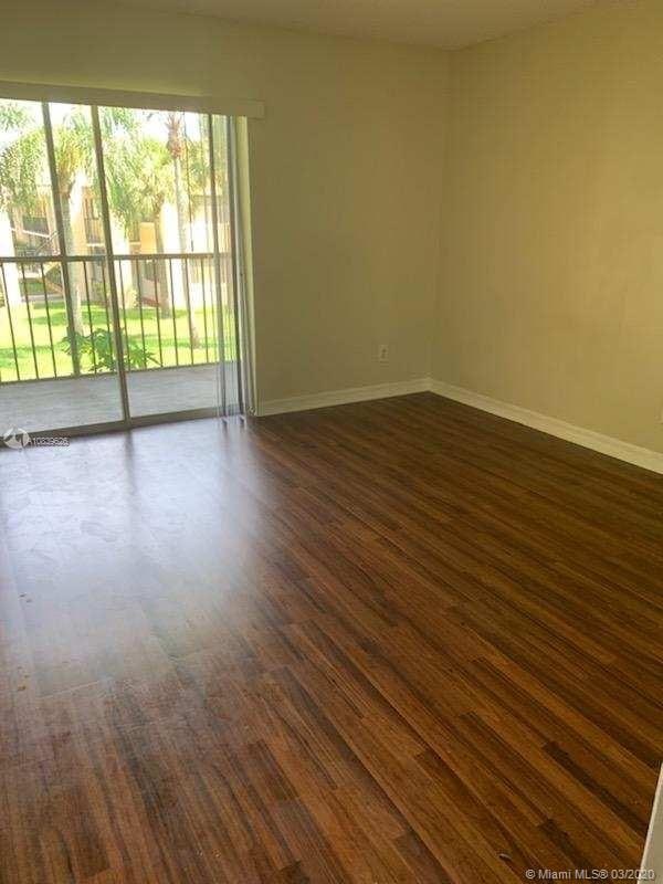 empty room featuring dark hardwood / wood-style floors