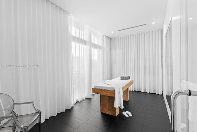 bedroom featuring dark tile patterned floors