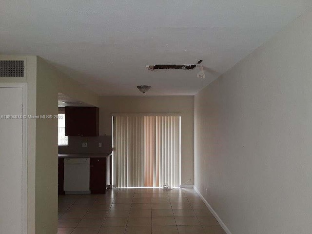 interior space with tile patterned floors