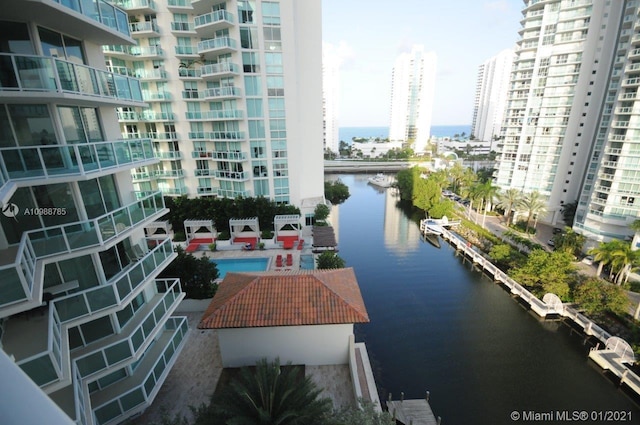 balcony featuring a water view