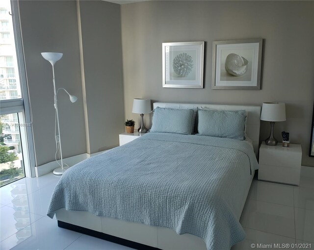 bedroom featuring light tile flooring