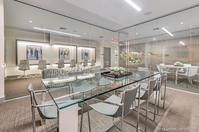 dining area with carpet