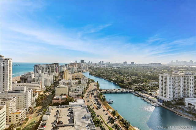 birds eye view of property featuring a water view