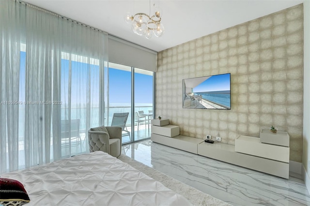 bedroom featuring a notable chandelier