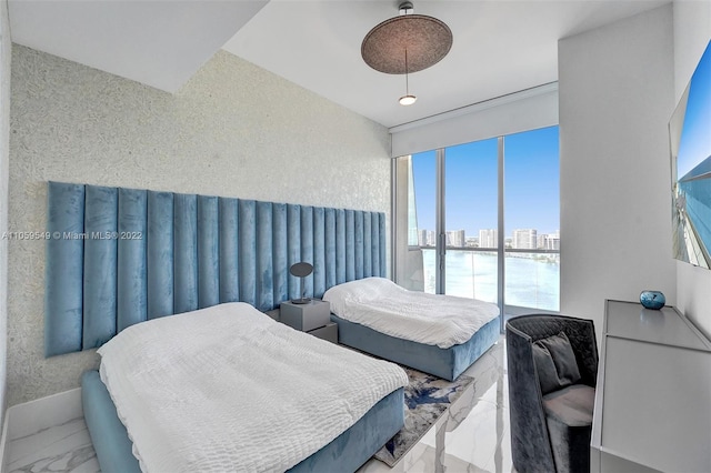 bedroom featuring multiple windows