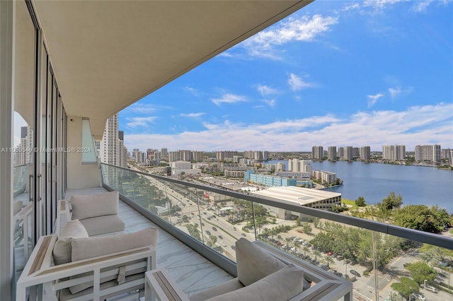 balcony featuring a water view