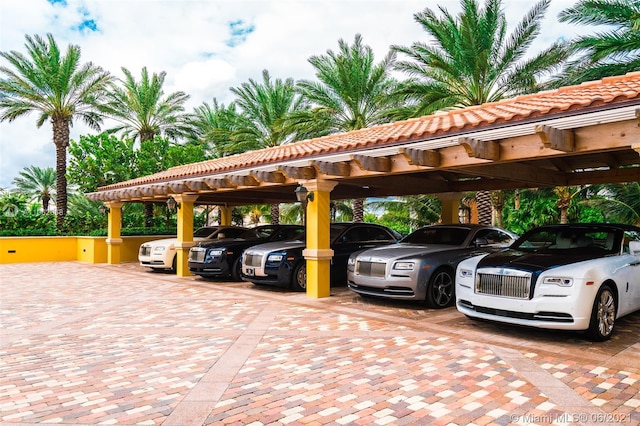 view of parking featuring a carport